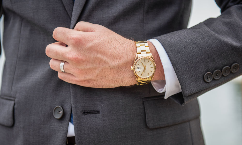 gold luxury watch on wrist pimbex